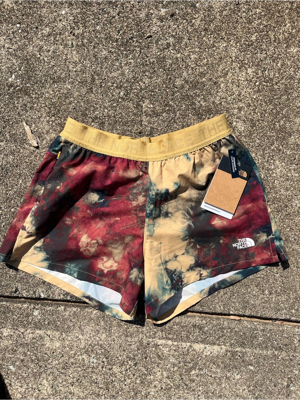 The North Face Women's Tie-Dye Athletic Shorts in Red and Tan